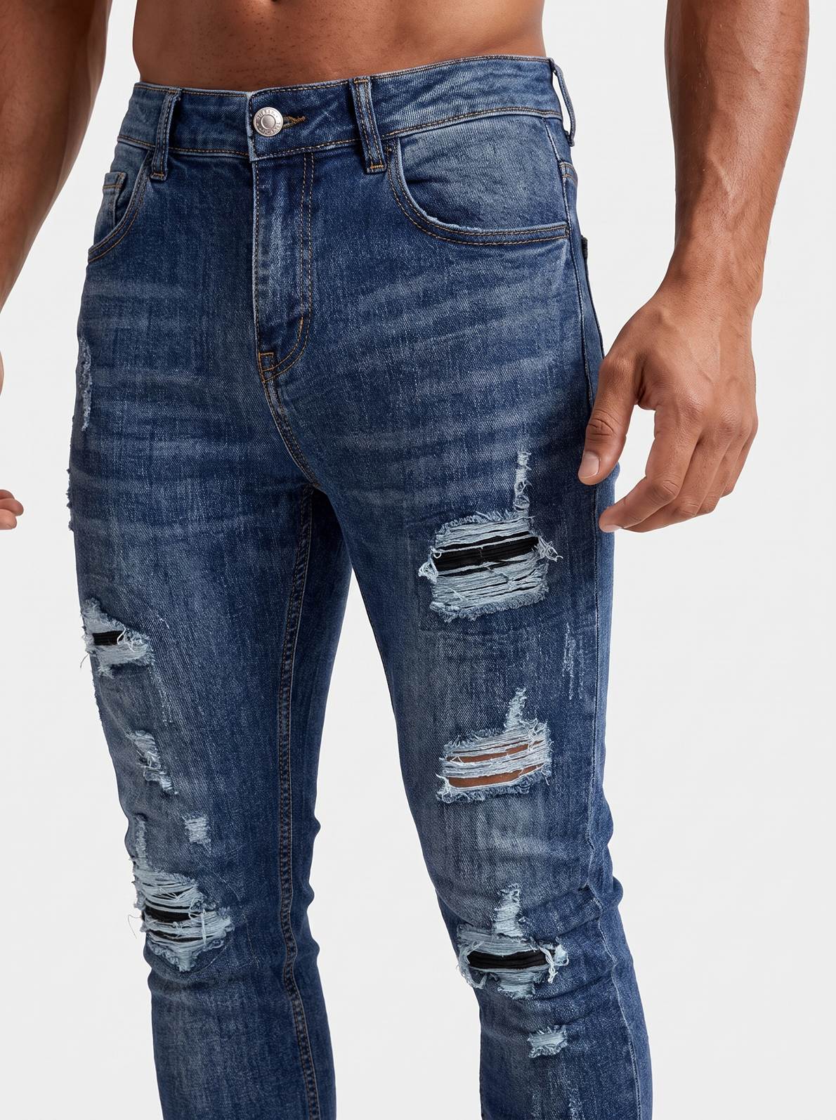The Lucio Jeans - Ripped Dark Blue – detail