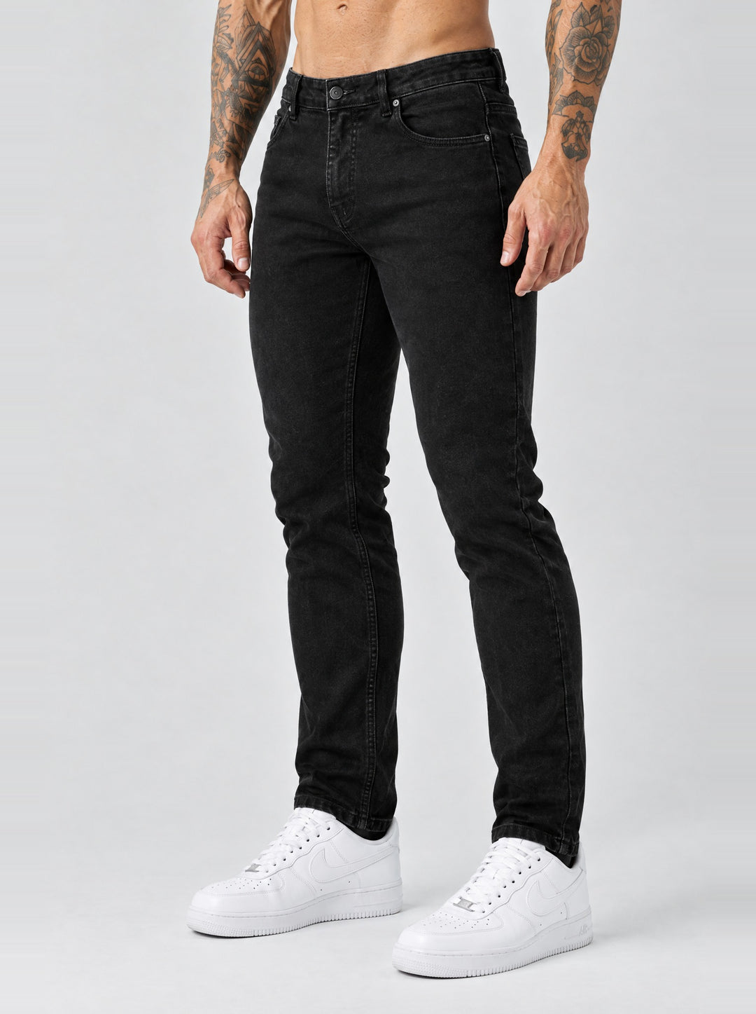 The Mateo Jeans - Black – regular straight fit, side angle