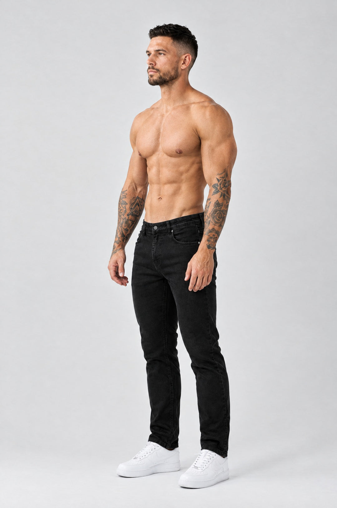 The Mateo Jeans - Black – regular straight fit, half side view