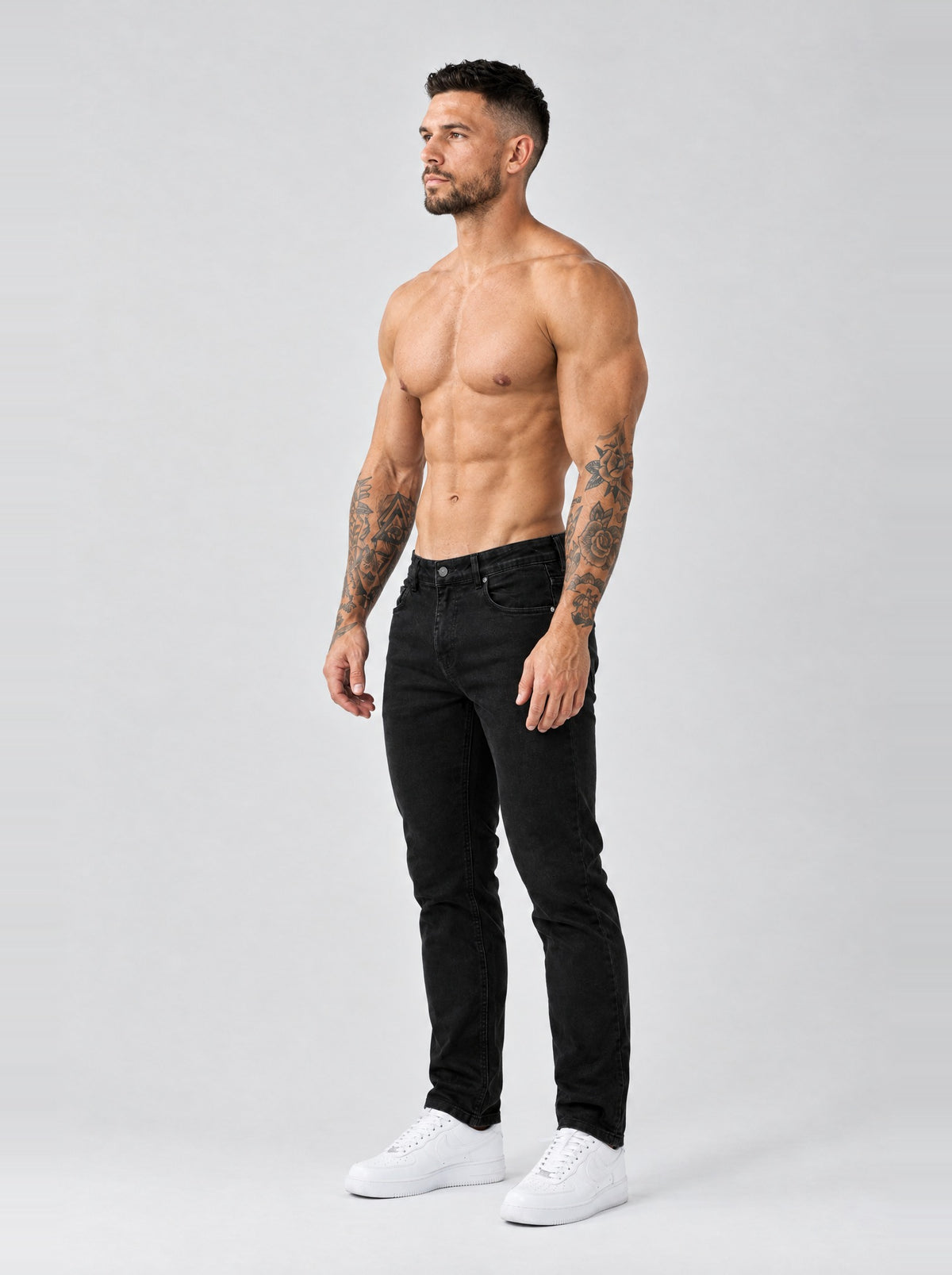 The Mateo Jeans - Black – regular straight fit, half side view