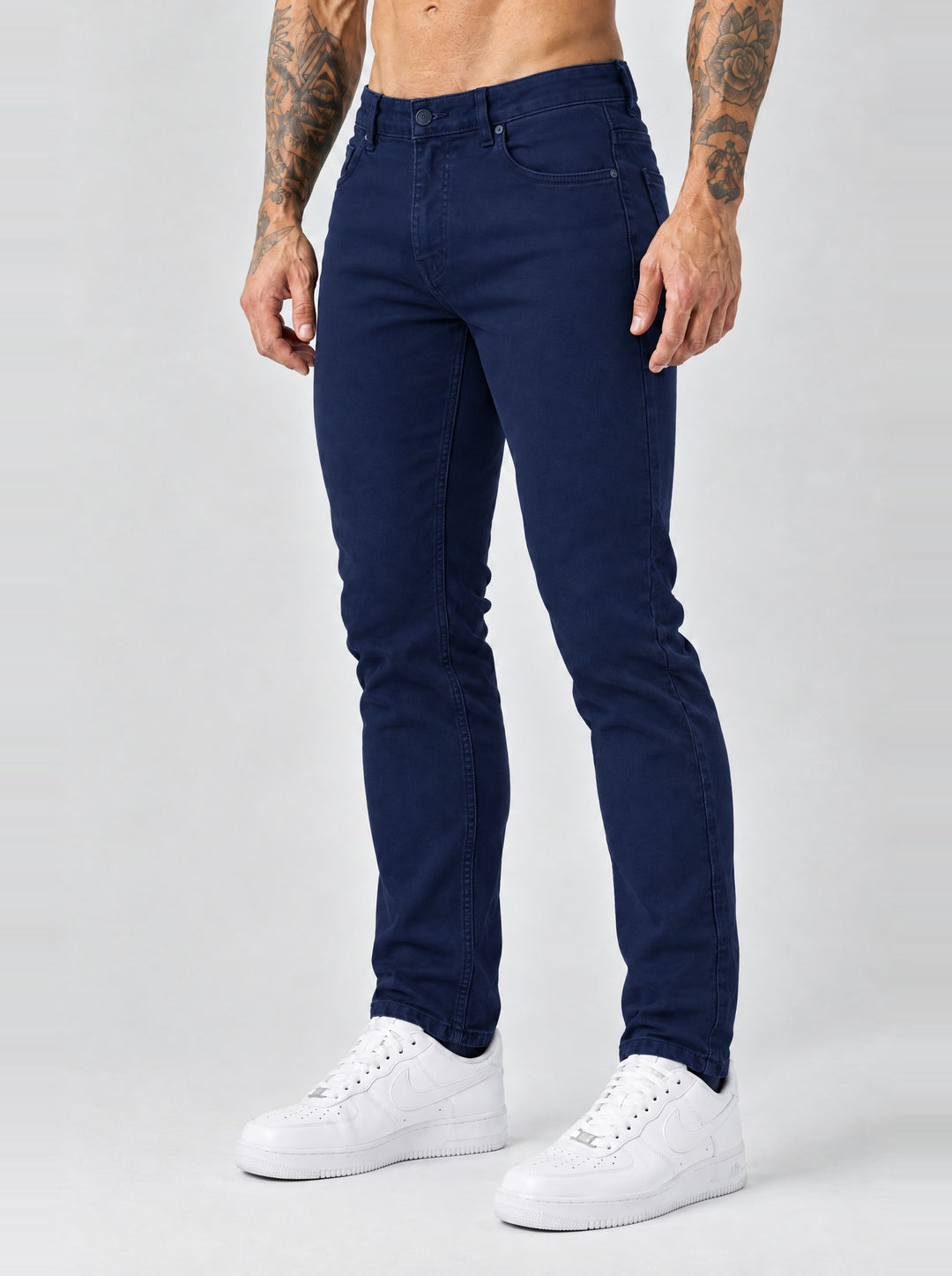 The Mateo Jeans - Navy Blue – regular straight fit, side angle