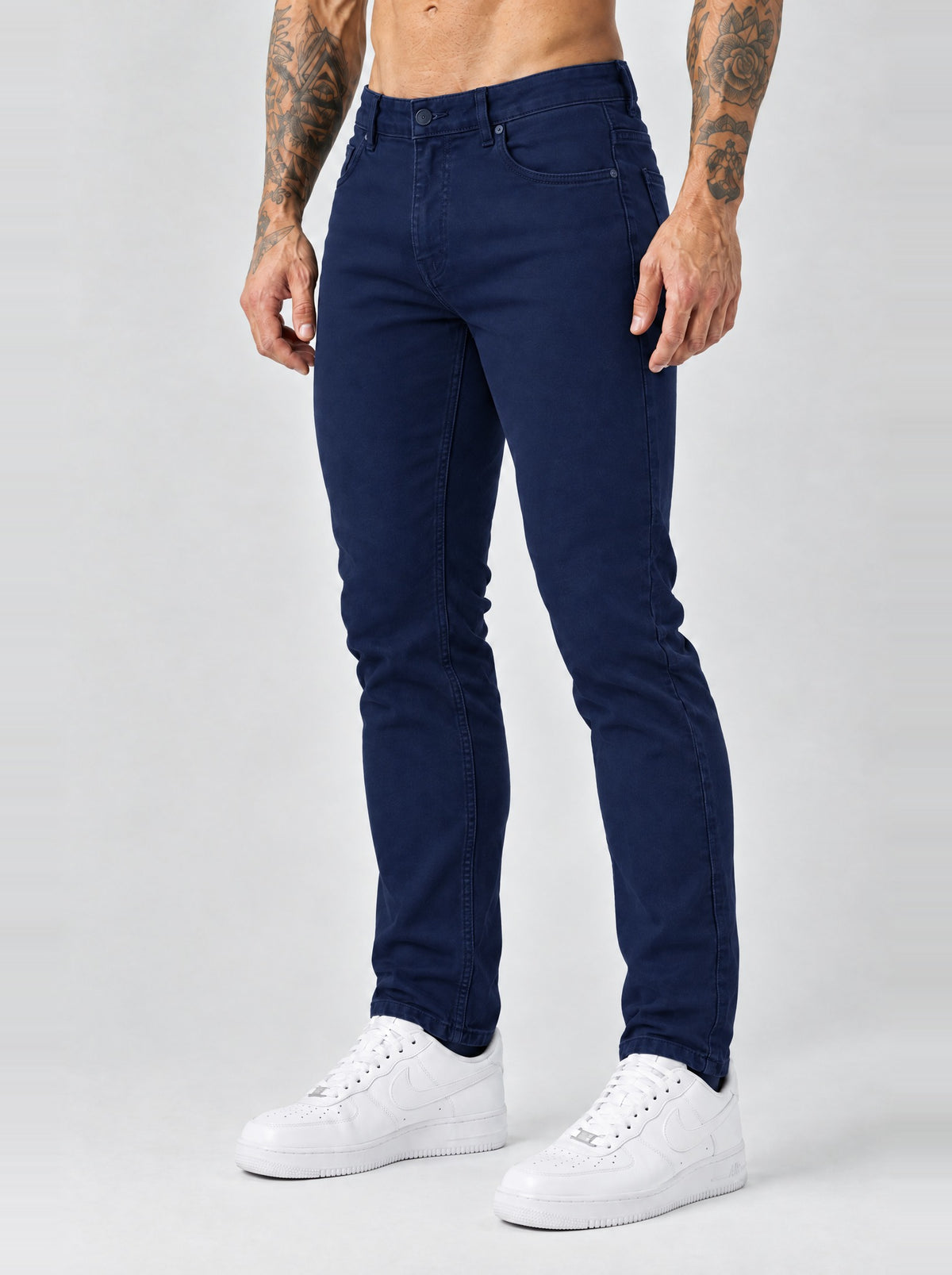 The Mateo Jeans - Navy Blue – regular straight fit, side angle