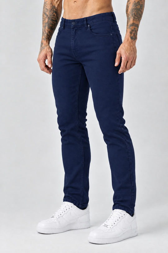 The Mateo Jeans - Navy Blue – regular straight fit, side angle