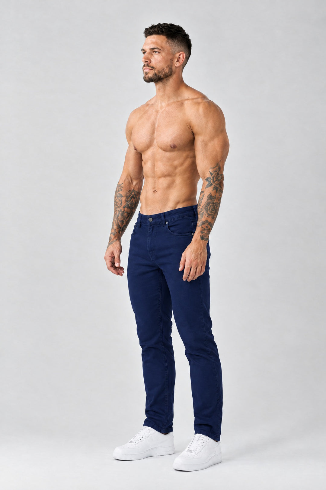 The Mateo Jeans - Navy Blue – regular straight fit, half side view