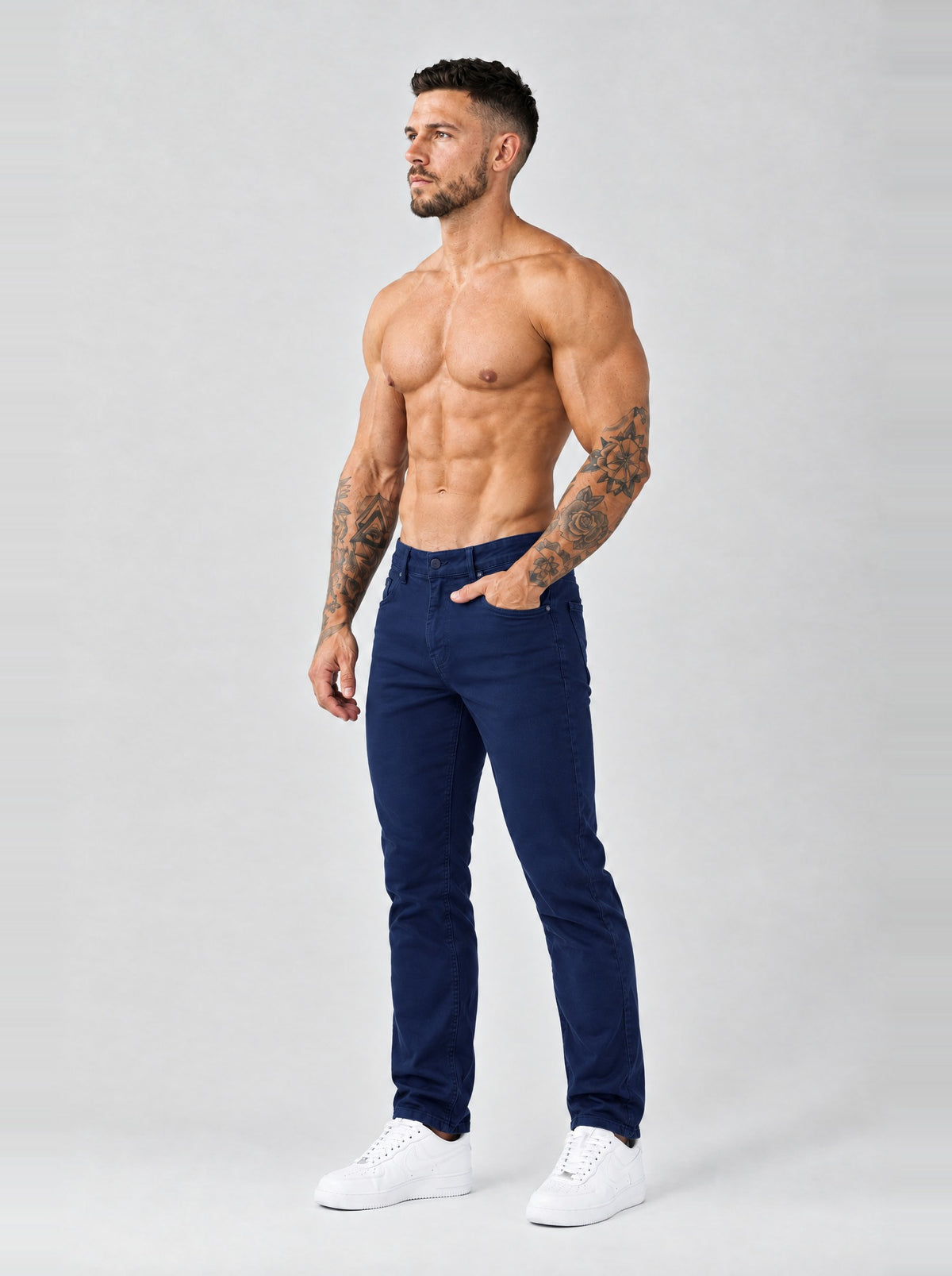 The Mateo Jeans - Navy Blue – regular straight fit, half side view